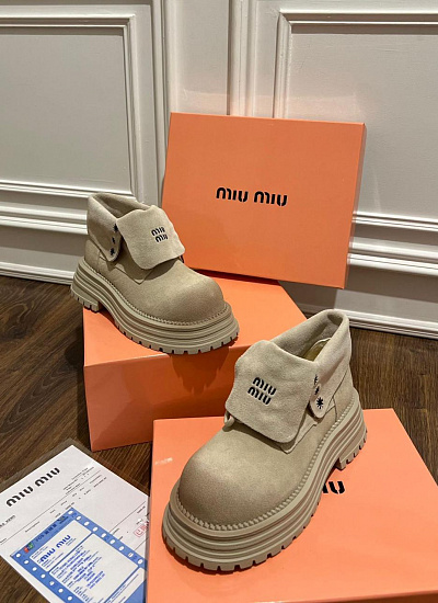 Ботинки меховые Miu Miu